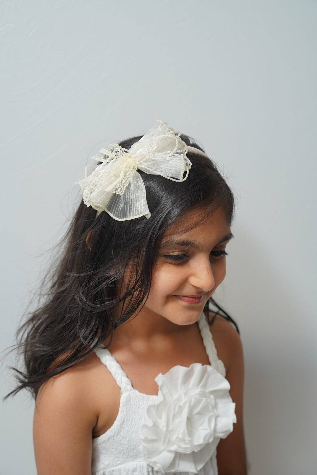 Mesh flower with beaded bows