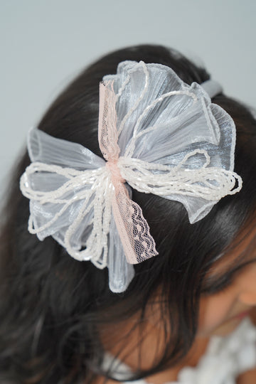 Mesh flower with beaded bows