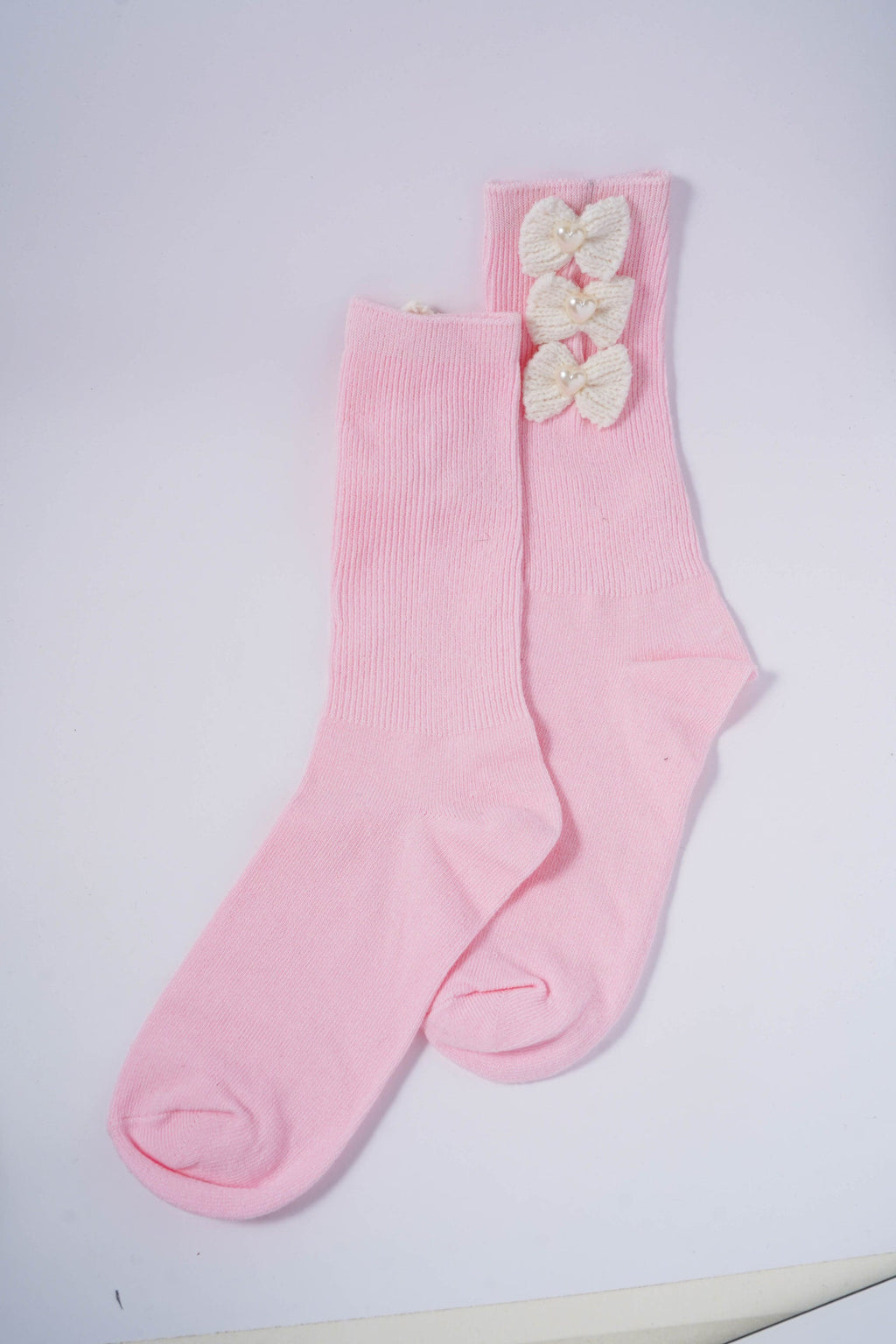 Socks with Knitted Cream Bows