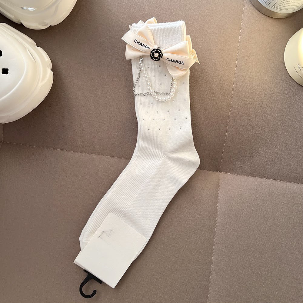 Black ribbed socks with pearl danglers